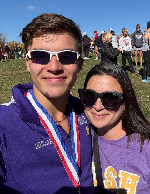 Brayden and Kim pose for photo after a race
