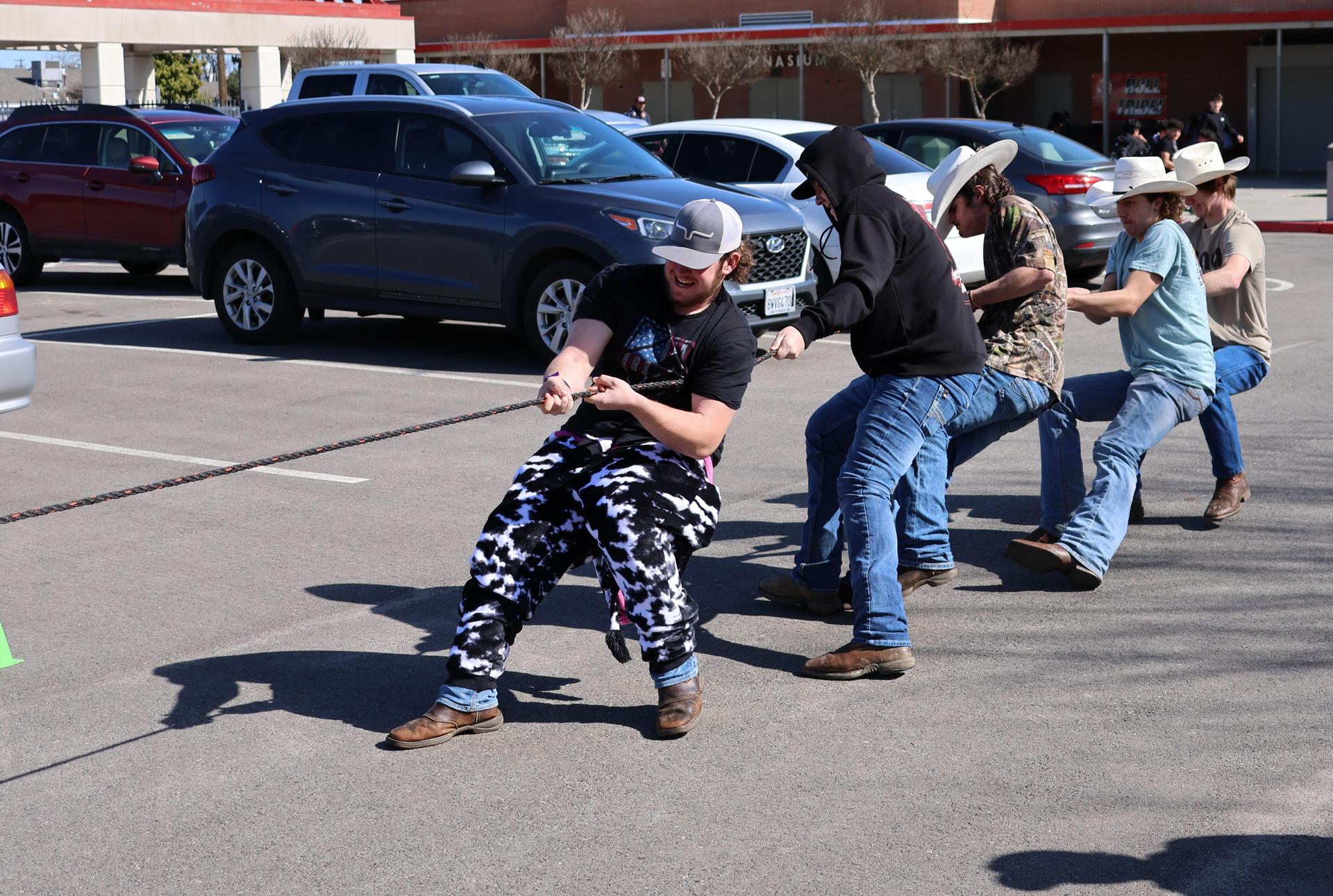 students and staff enjoying the truck pull