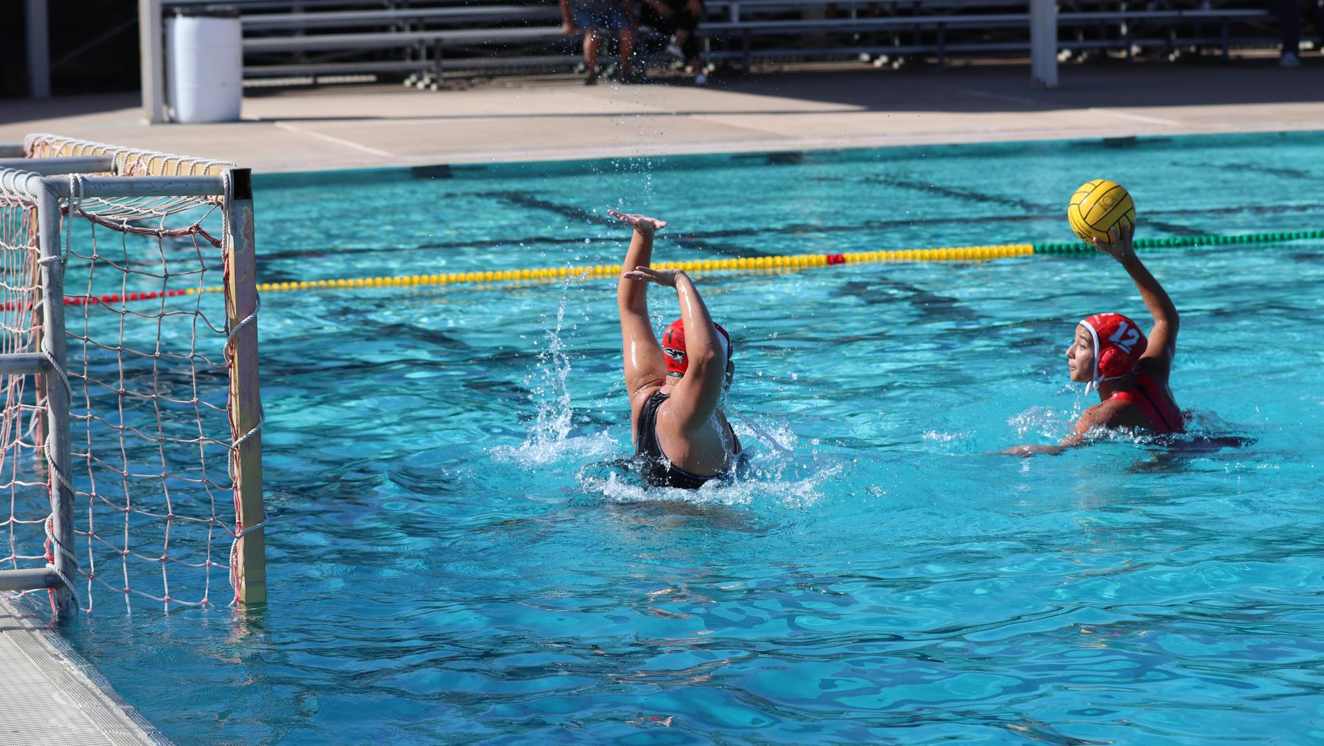 girls playing water polo against Hoover