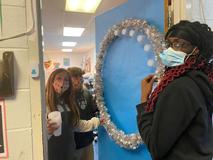 Students working on Christmas door decorations