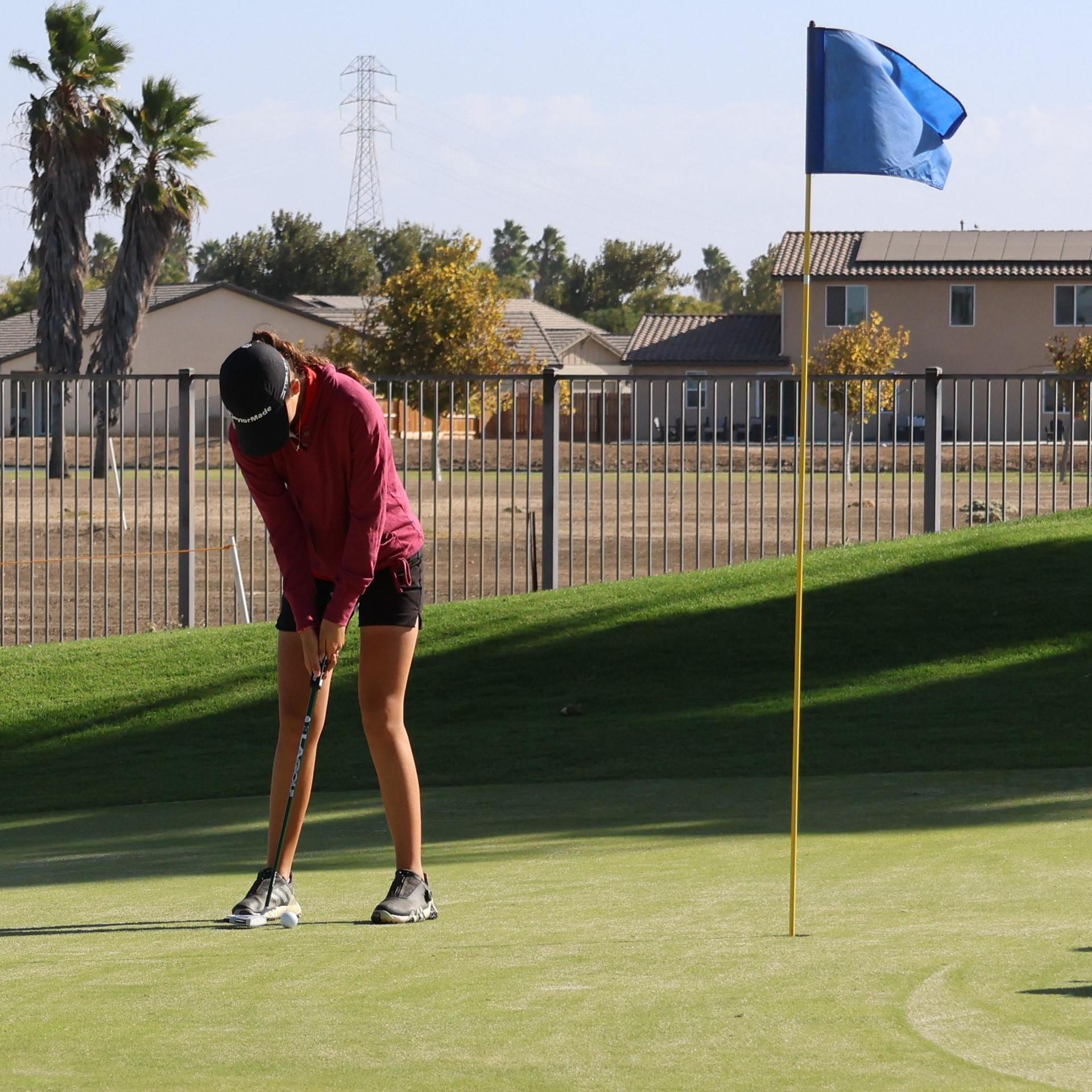 Girls golfers in action at the championships