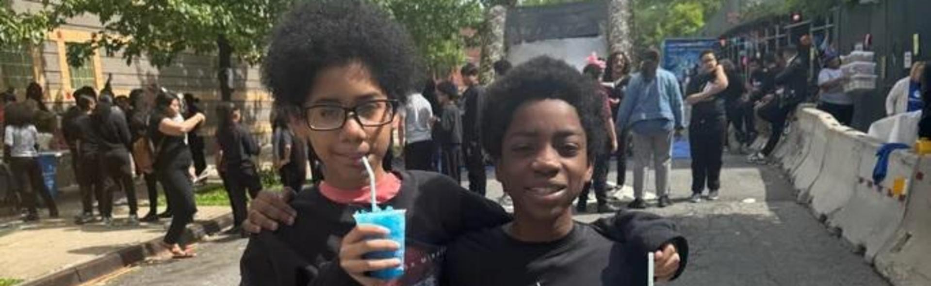 Students enjoying a cool drink outside