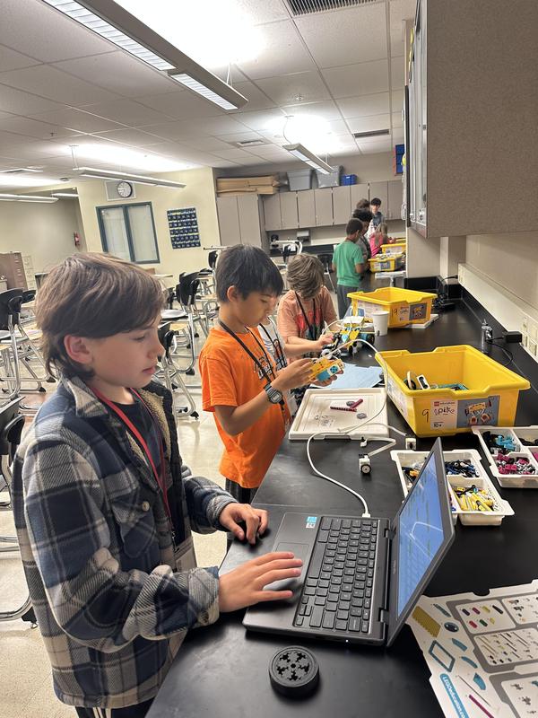 students working on computers at STEAM Camp