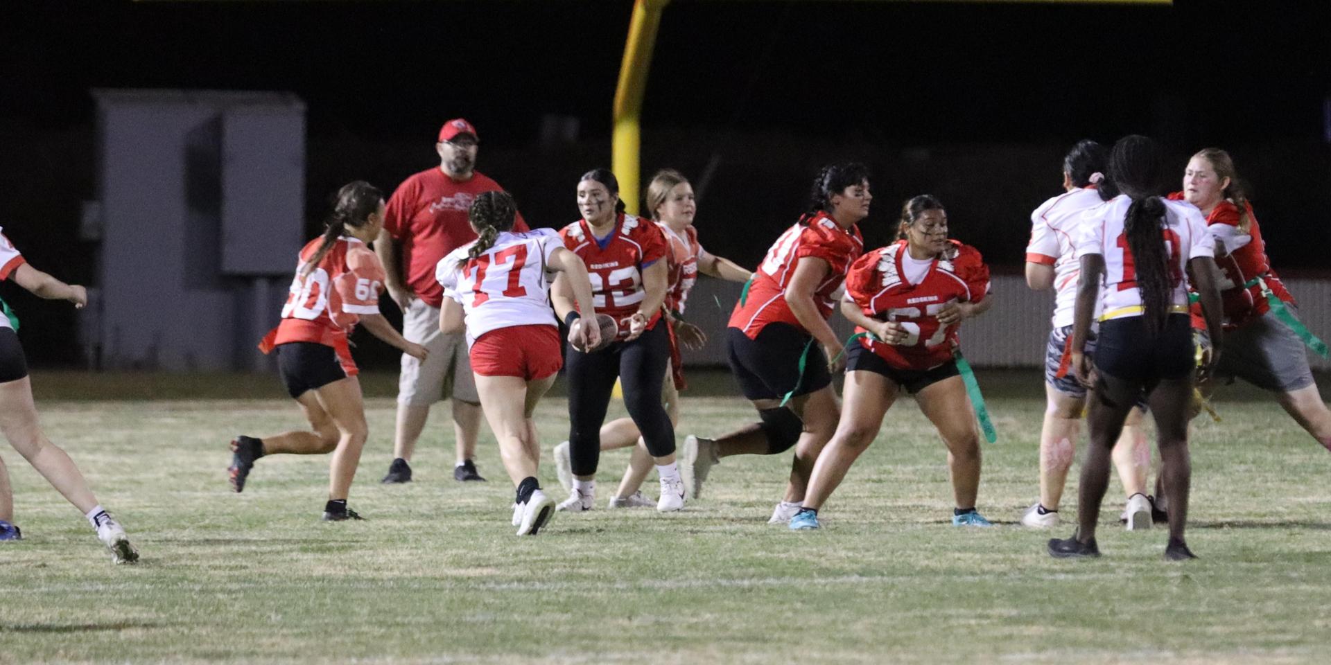 girls playing flag football