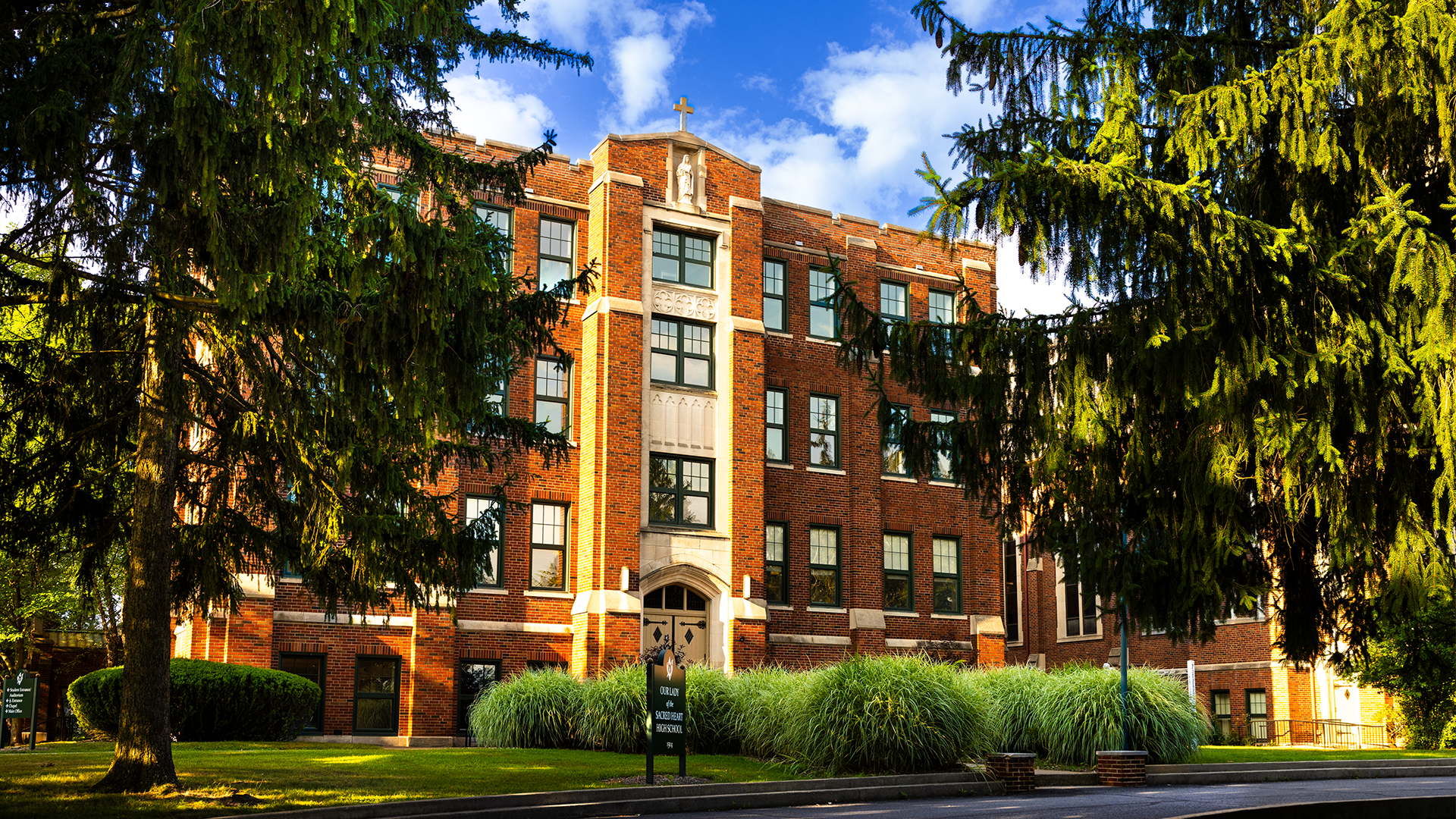 OLSH High School building with trees