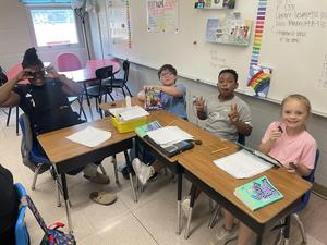 Mrs. Roe's fourth graders reviewed opinion writing by participating in OREO writing today! Their prompt was “Should girls be allowed to play football?” Of course, they ended with a little snack!