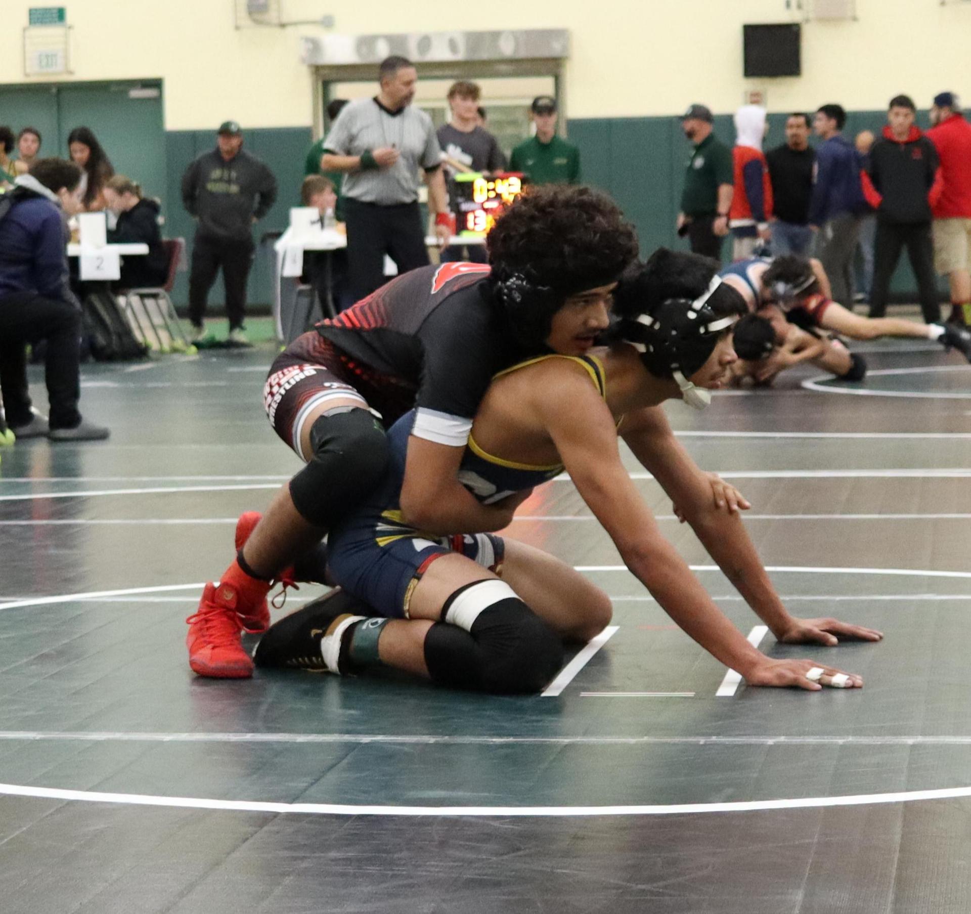 wrestlers in action at the Hawks invitational