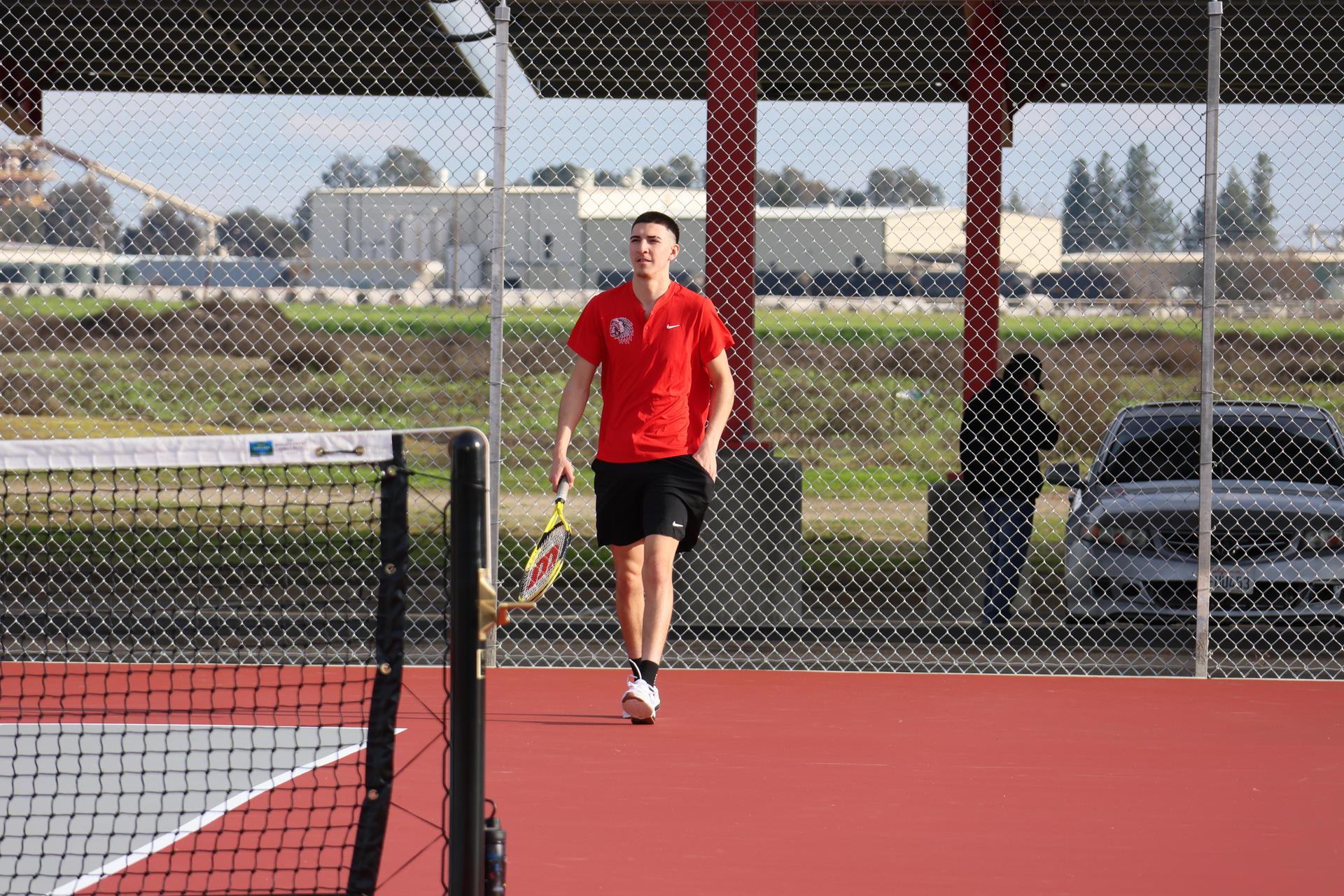 CUHS Boys playing tennis against coalinga