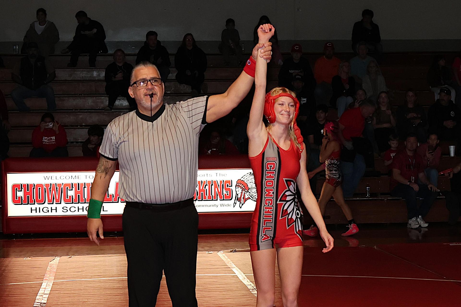 Wrestling winners with hands up 4