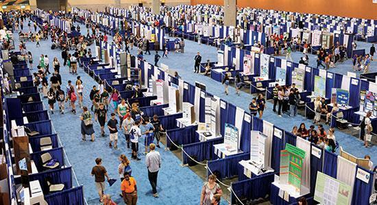 Event hall filled with science fair projects