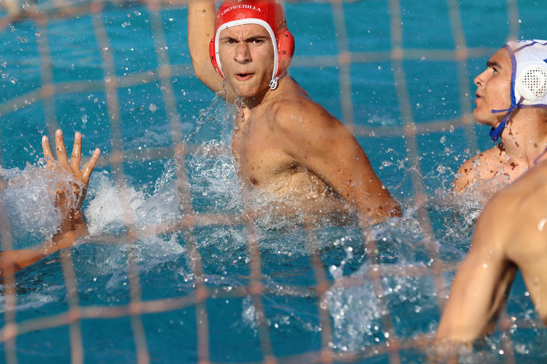 boys playing water polo against Madera
