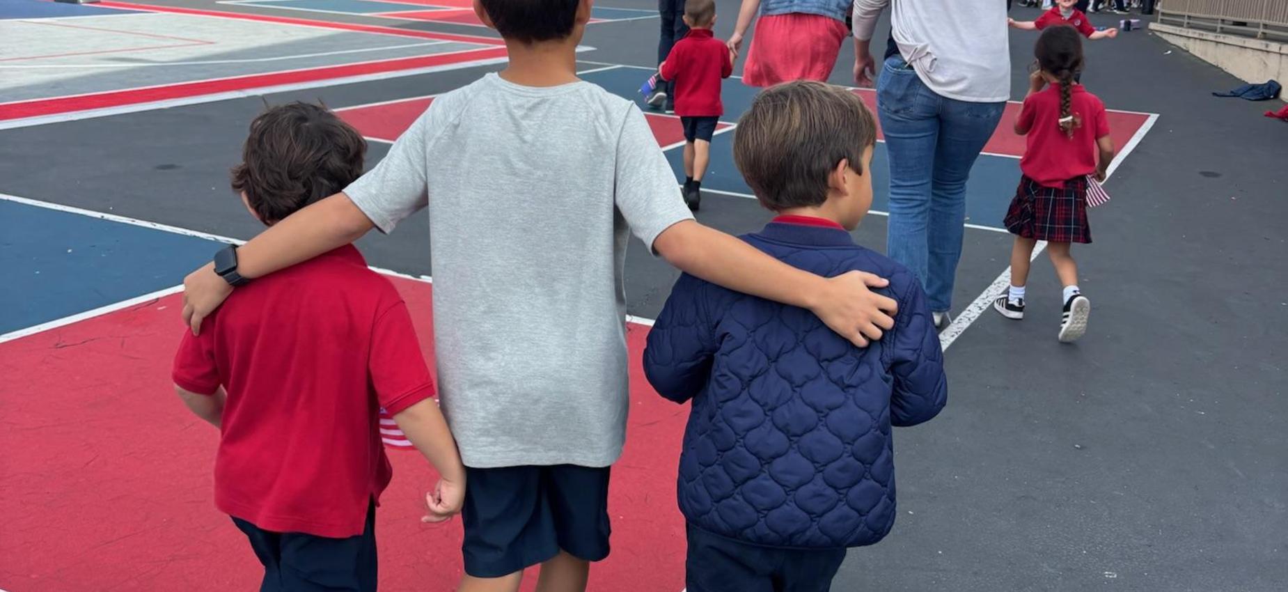 6th grade student walking with TK Friendship Buddies