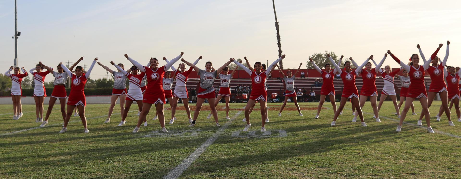 Cheerleaders performing at the football game