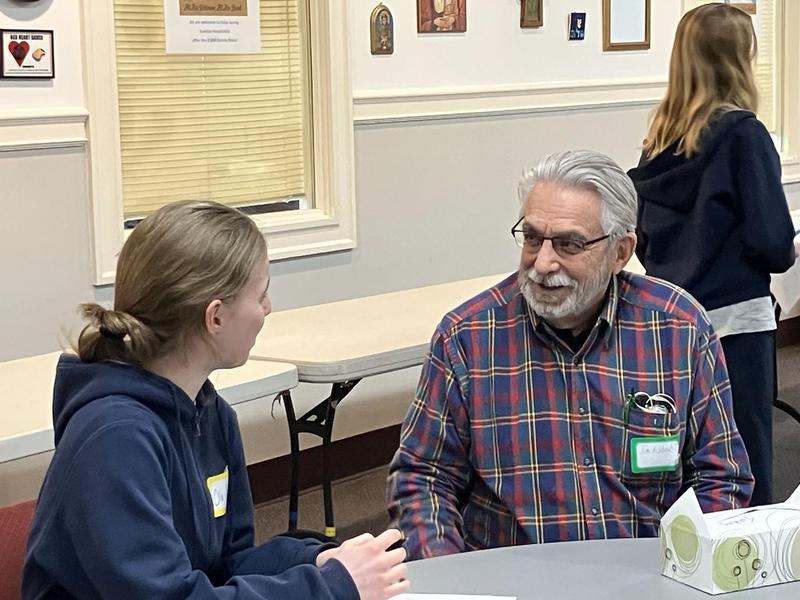 Students interacting with Neville Place residents
