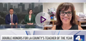 A screenshot shows two news anchors at the news desk interviewing teacher Dr. Povinelli
