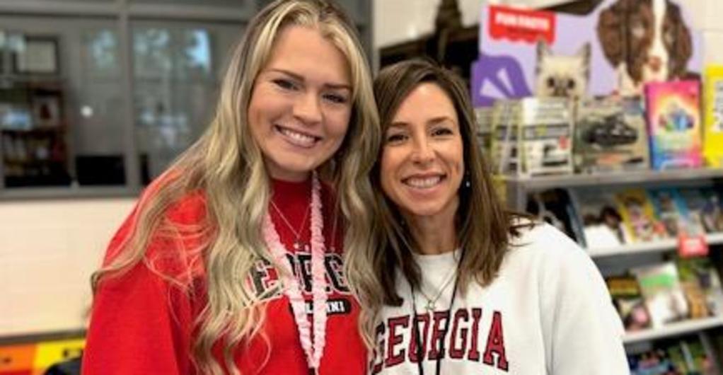 Teachers pose with team shirts for Red Ribbon Week