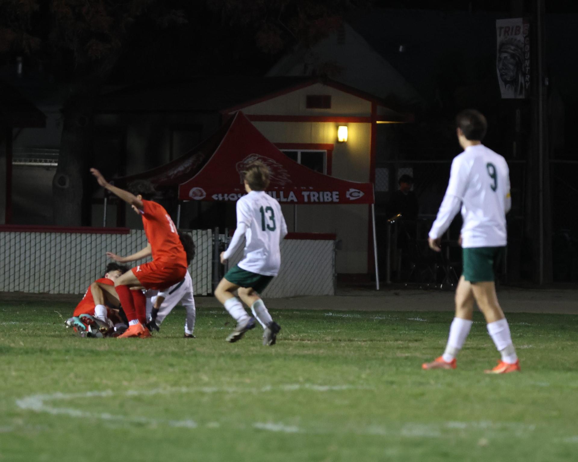 Varsity boys play soccer against Kingsburg