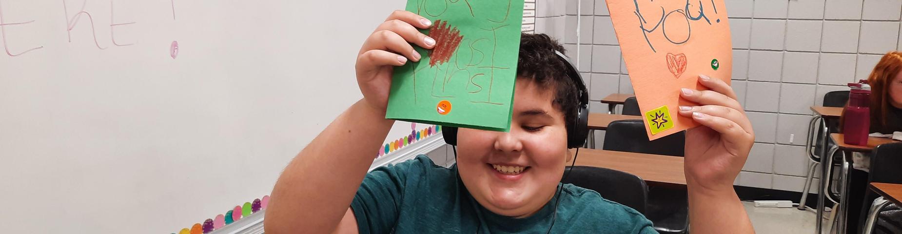 A student writing thank you notes to teachers!