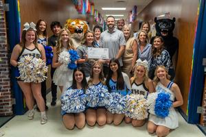 Student spirit squads and Frenship Foundation donors surprise teacher during Prize Patrol.