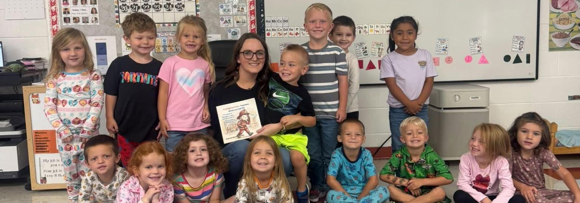 Deputy 911 Director Lakin Hess read to students at CES as part of the Community Connections program.