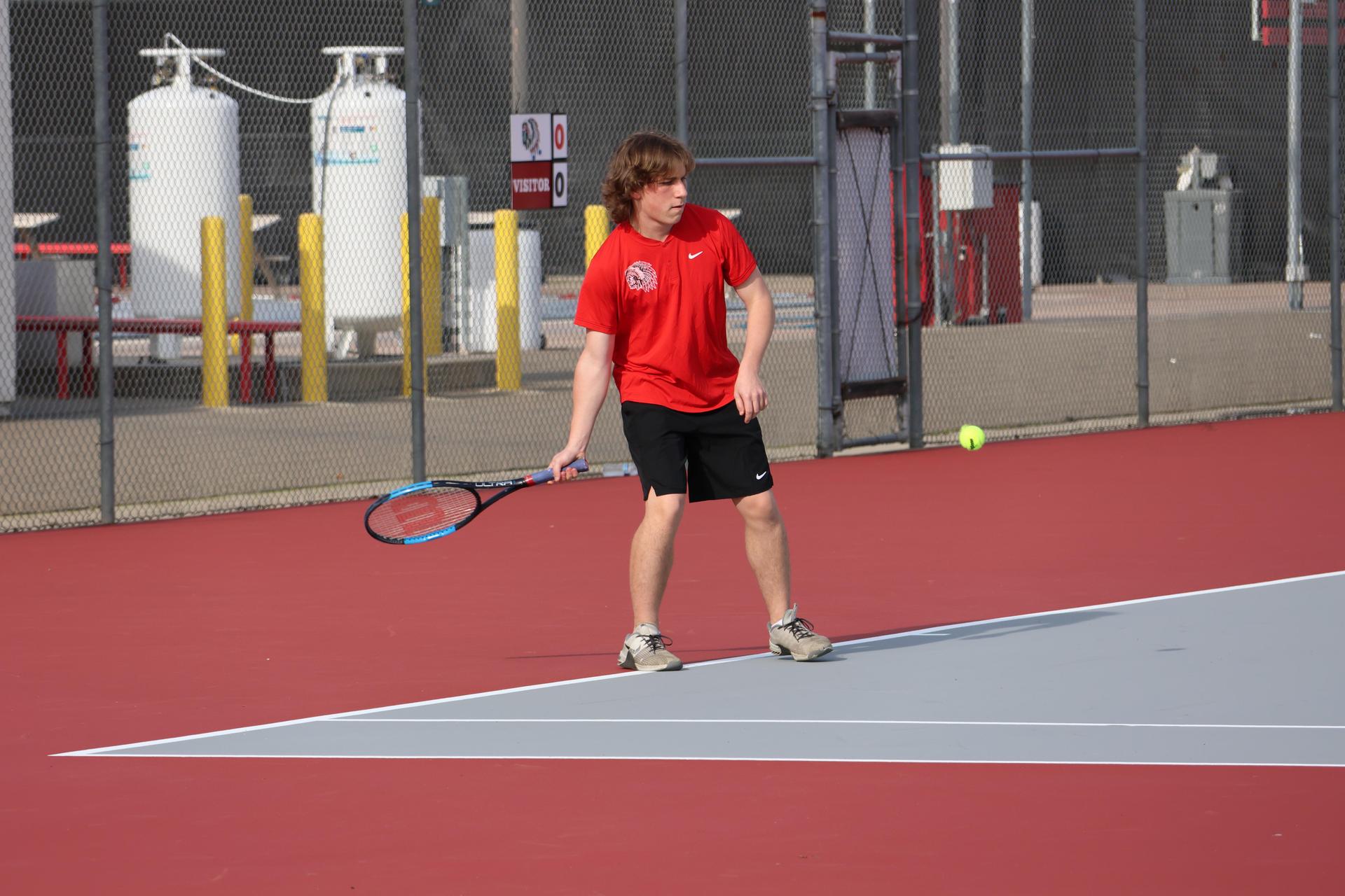 CUHS Boys playing tennis against coalinga