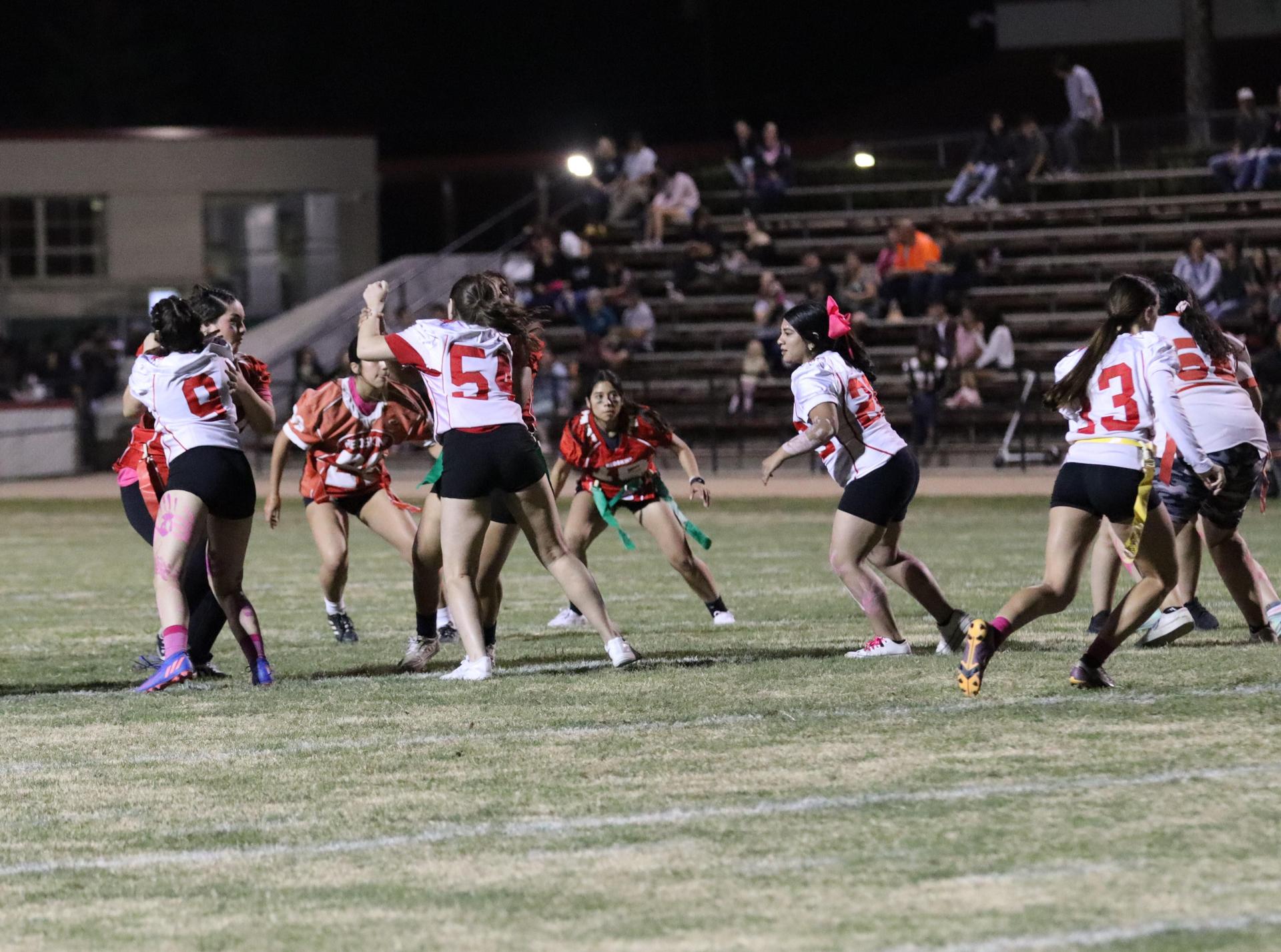 girls playing flag football