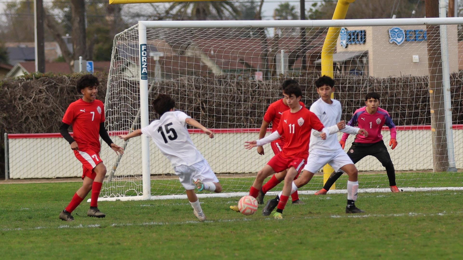 junior varsity boys playing soccer against washington union