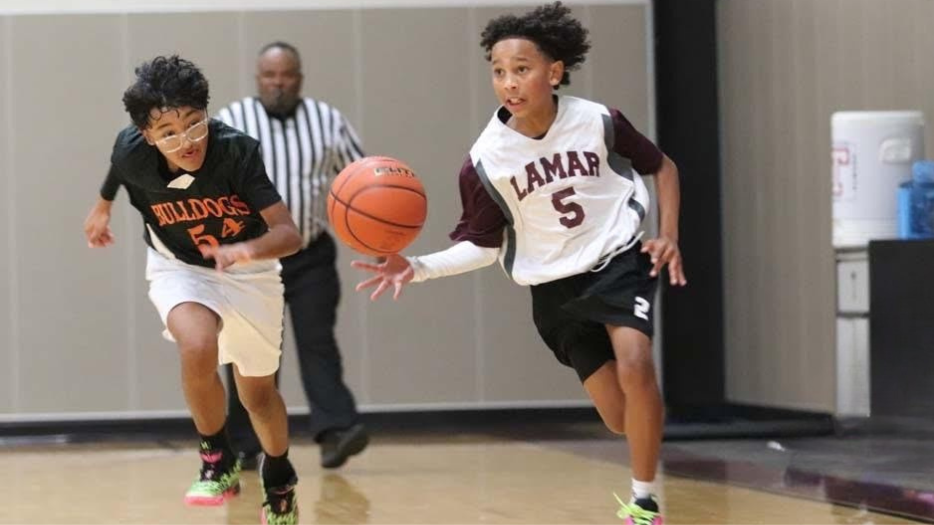 boys playing basketball 25-26