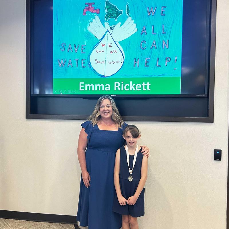 Teacher and student at EMWD Poster Contest Awards