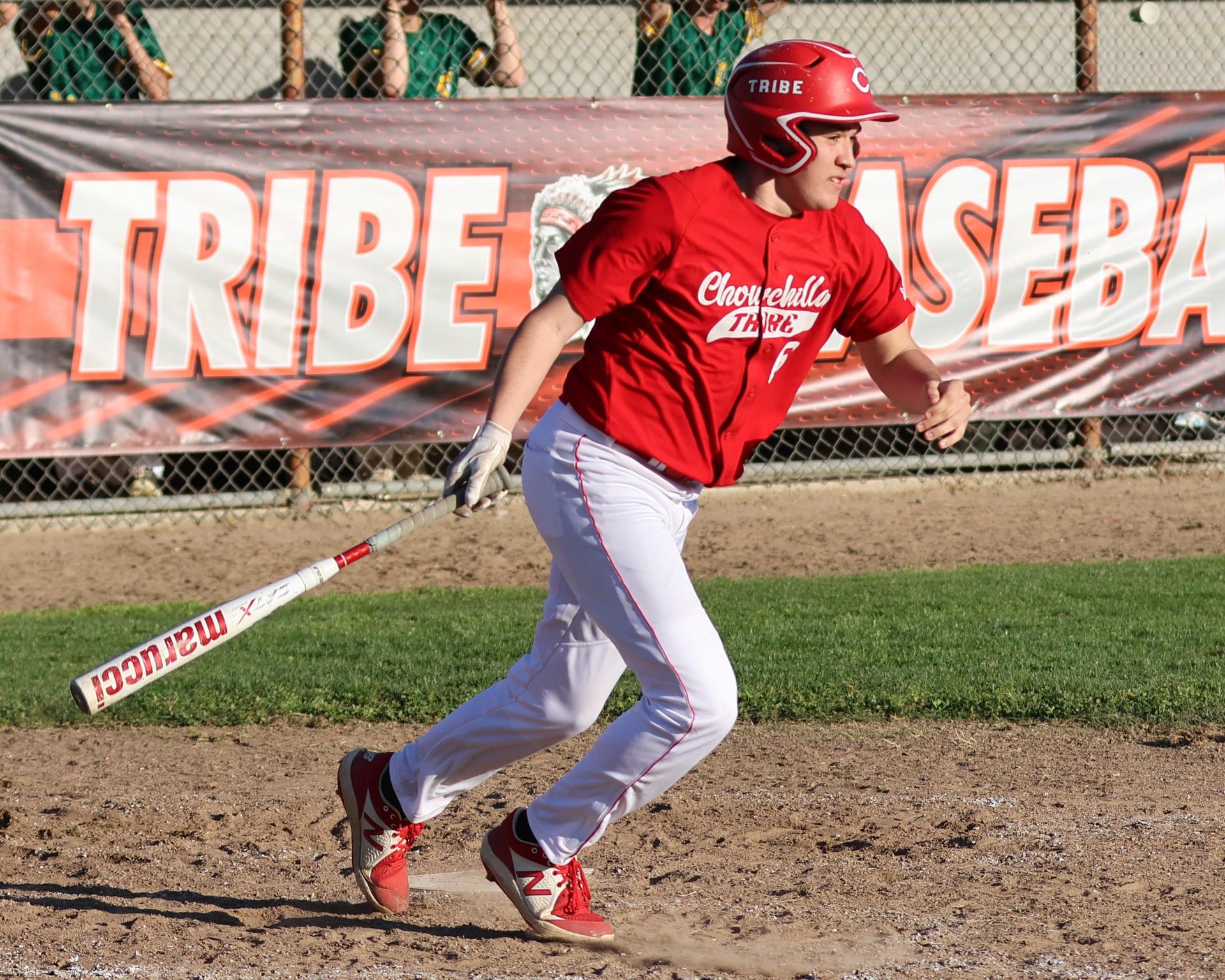 junior varsity baseball players in action