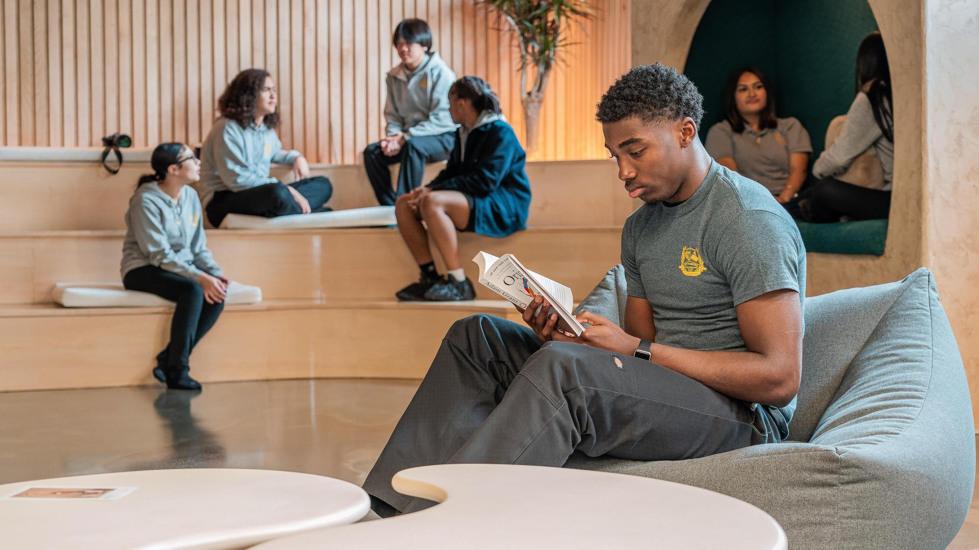 Student reading book