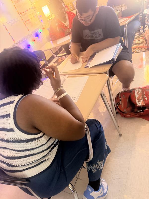 Picture 2 of two students talking