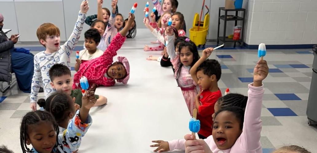 Students who met their reading challenge of 250 minutes enjoyed their red, white, and blue popsicle to conclude our America 250 reading month.