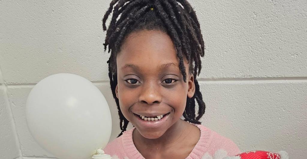 Student shows off her project