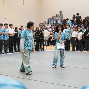 Two students lead an activity during the YES Symposium.