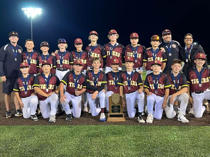 baseball team smiling after championship game