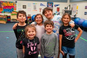 Students posing together at Legacy Elementary Family STEAM Night