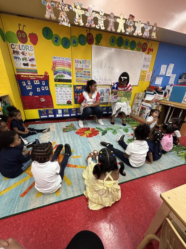 Students reading books by Hispanic authors