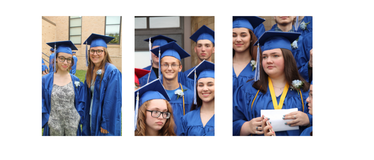 students in cap and gowns smiling