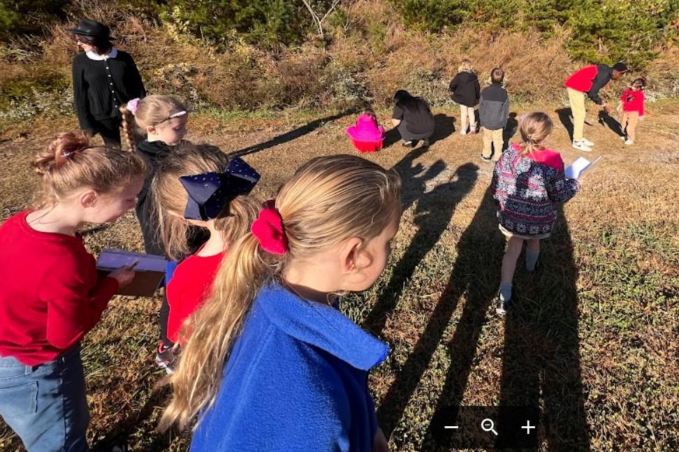 Students conducting an outdoor experiment.