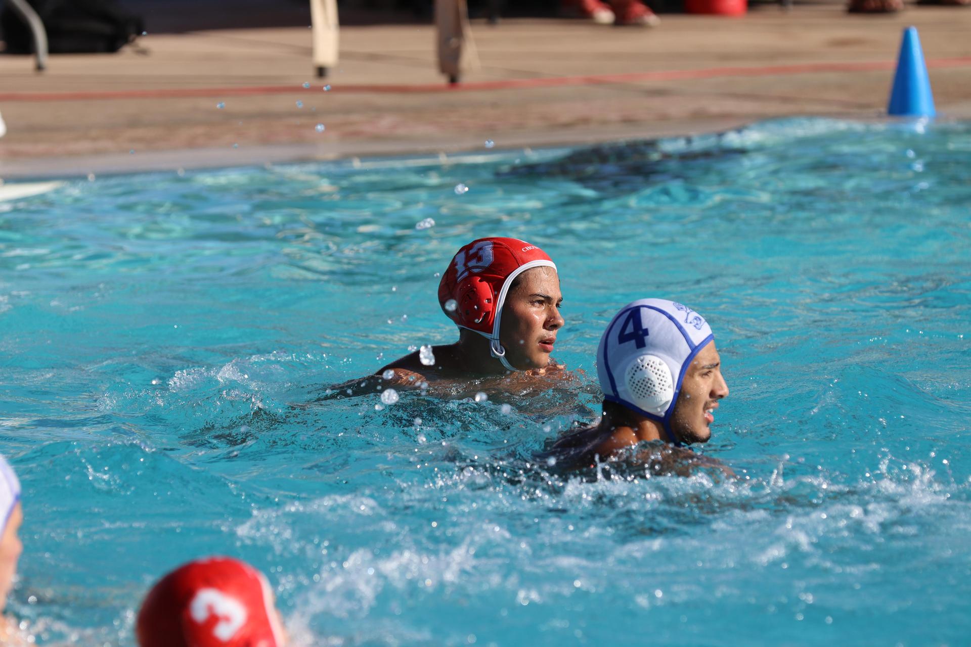 boys playing water polo against Madera