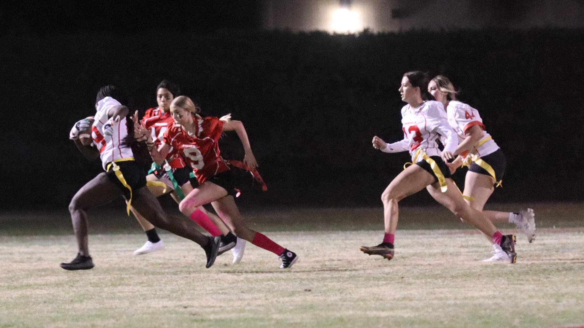 girls playing flag football