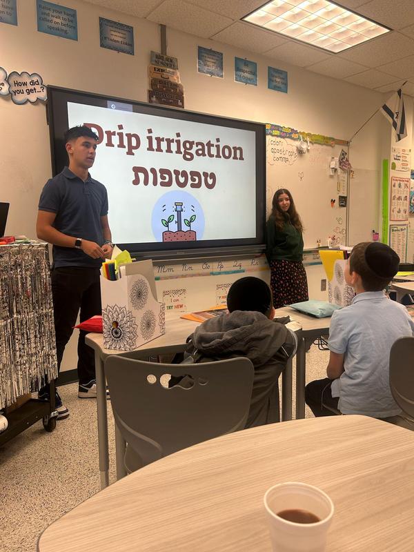 Fourth grade students learn about Drip Irrigation.