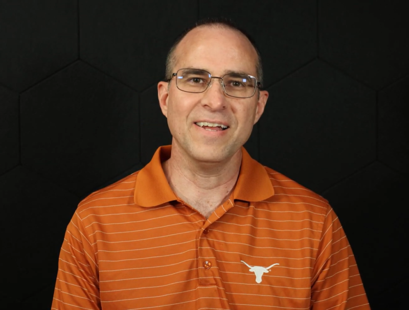 Chris Fant in orange shirt
