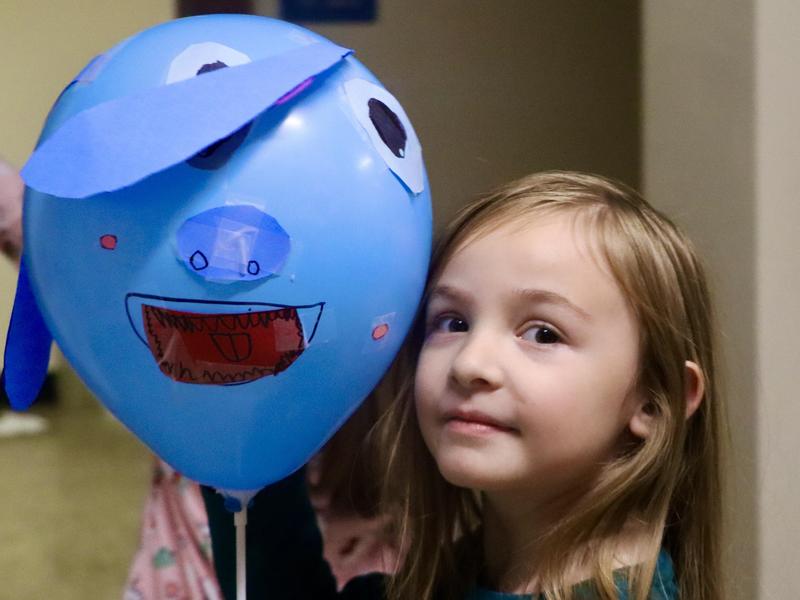 Student with balloon
