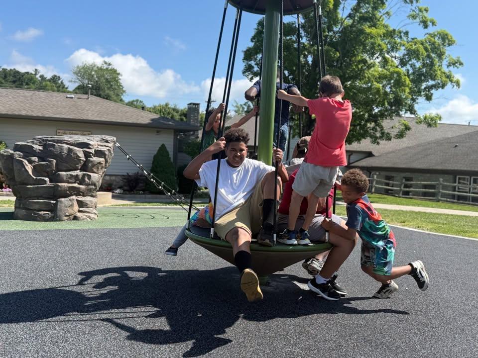 Kids playing on a swing