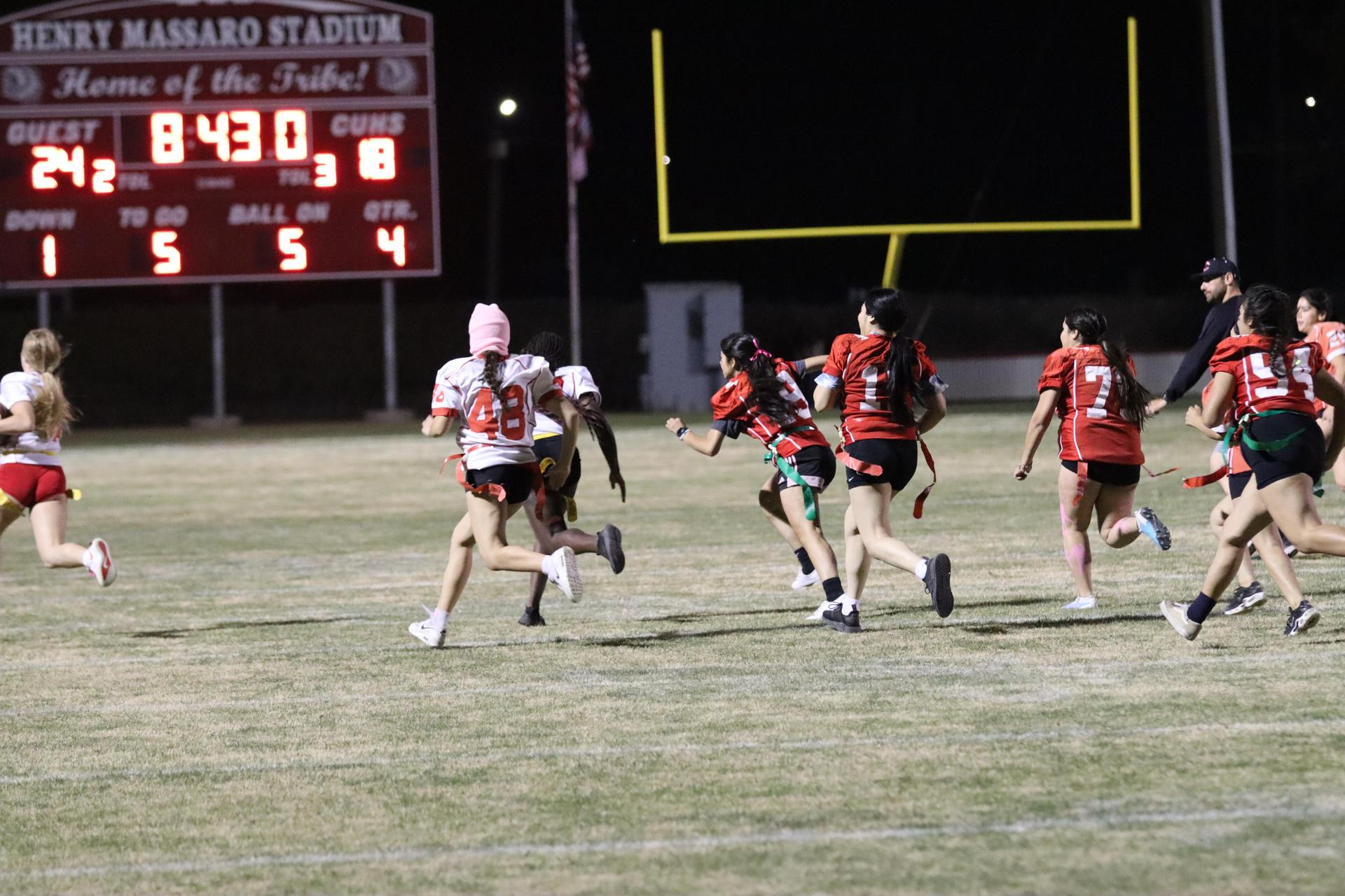 girls playing flag football