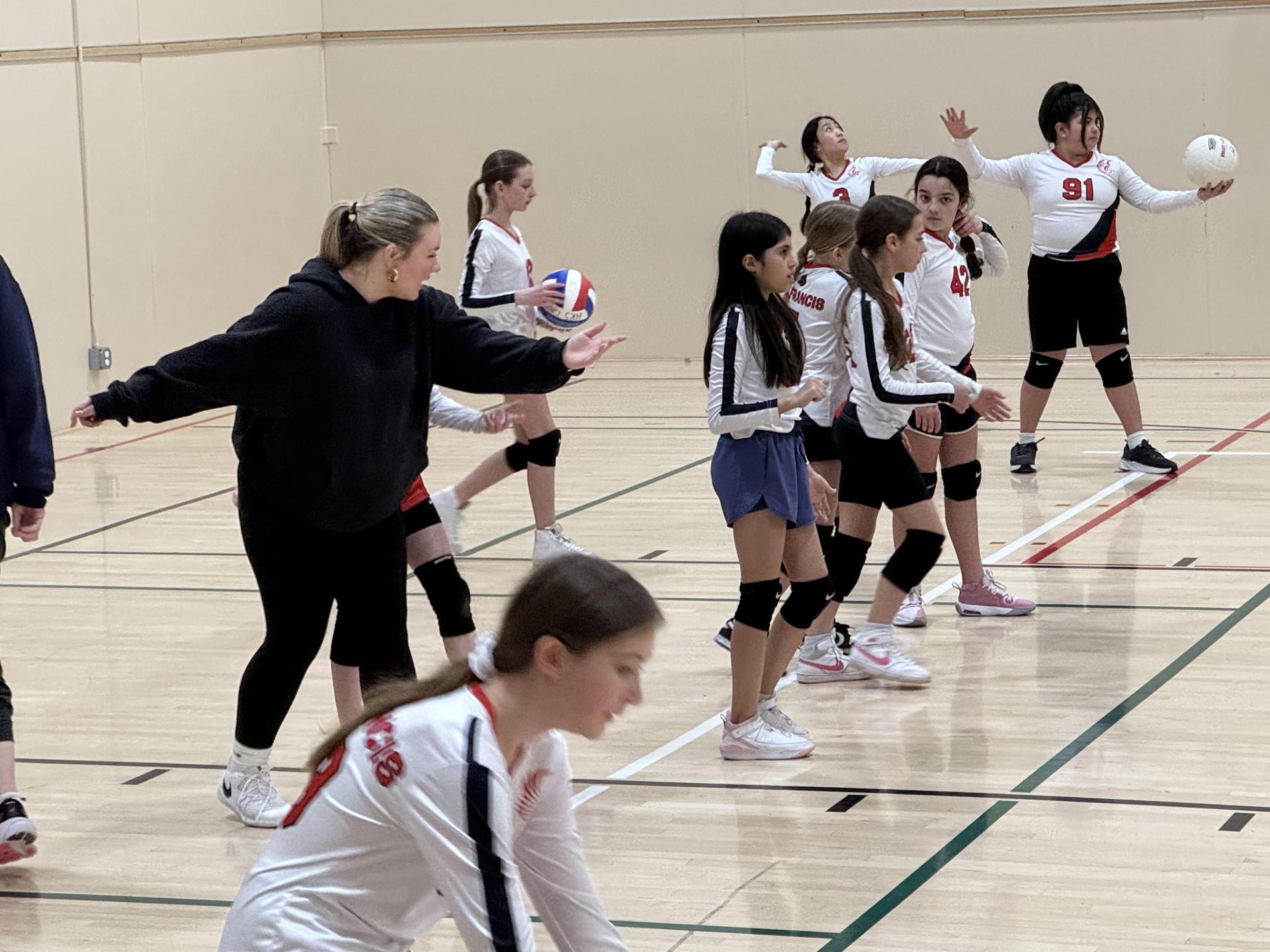 Girls on volleyball court