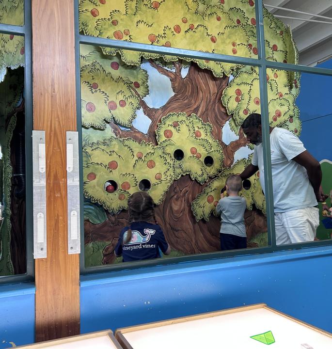 children playing with tree and apples
