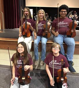 Group phot of students who are in the concert.